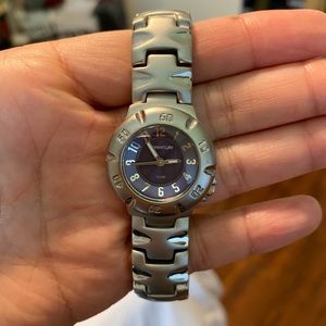 Silver Fossil watch with purple dial